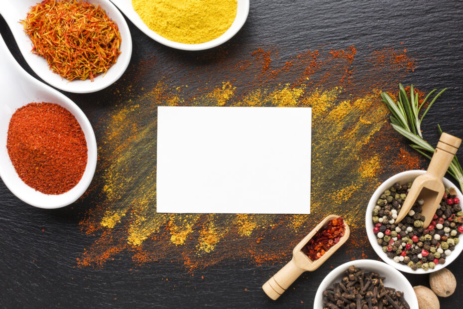 aara living Assorted whole and ground Indian spices in bowls and spoons