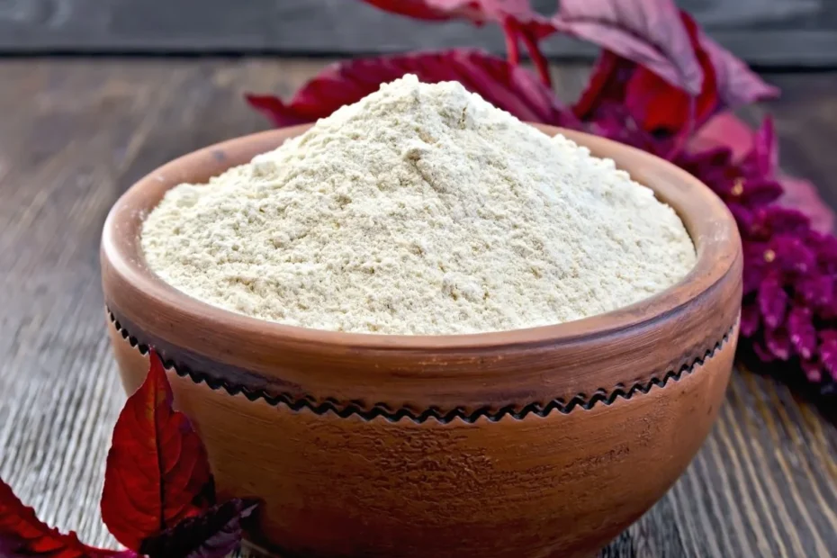 Amaranth flour - Rajgira Aata - in a wooden bowl with Amaranth Leaves - Aara Living