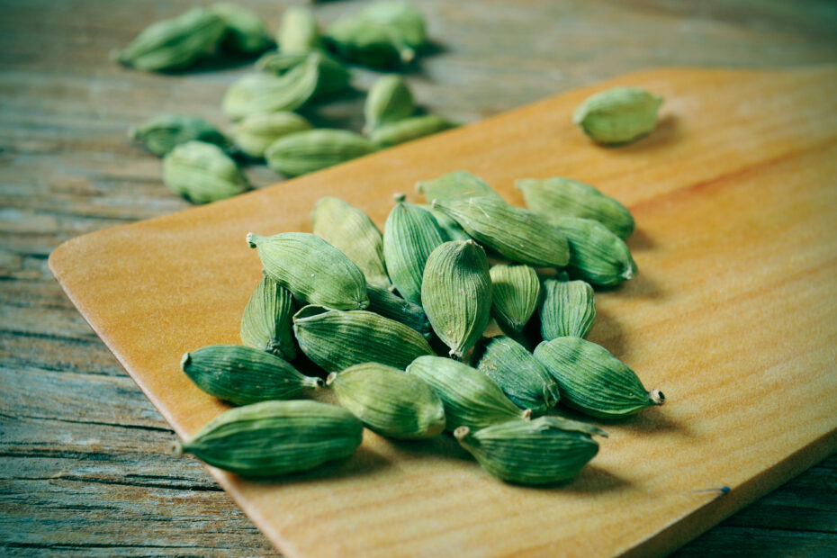 Close-up of fresh Green Cardamom (Chhoti Elaichi) pods, known for their sweet, camphor-like aroma and essential role in Indian cooking, chai, and sweets.